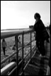 Woman by Railing
